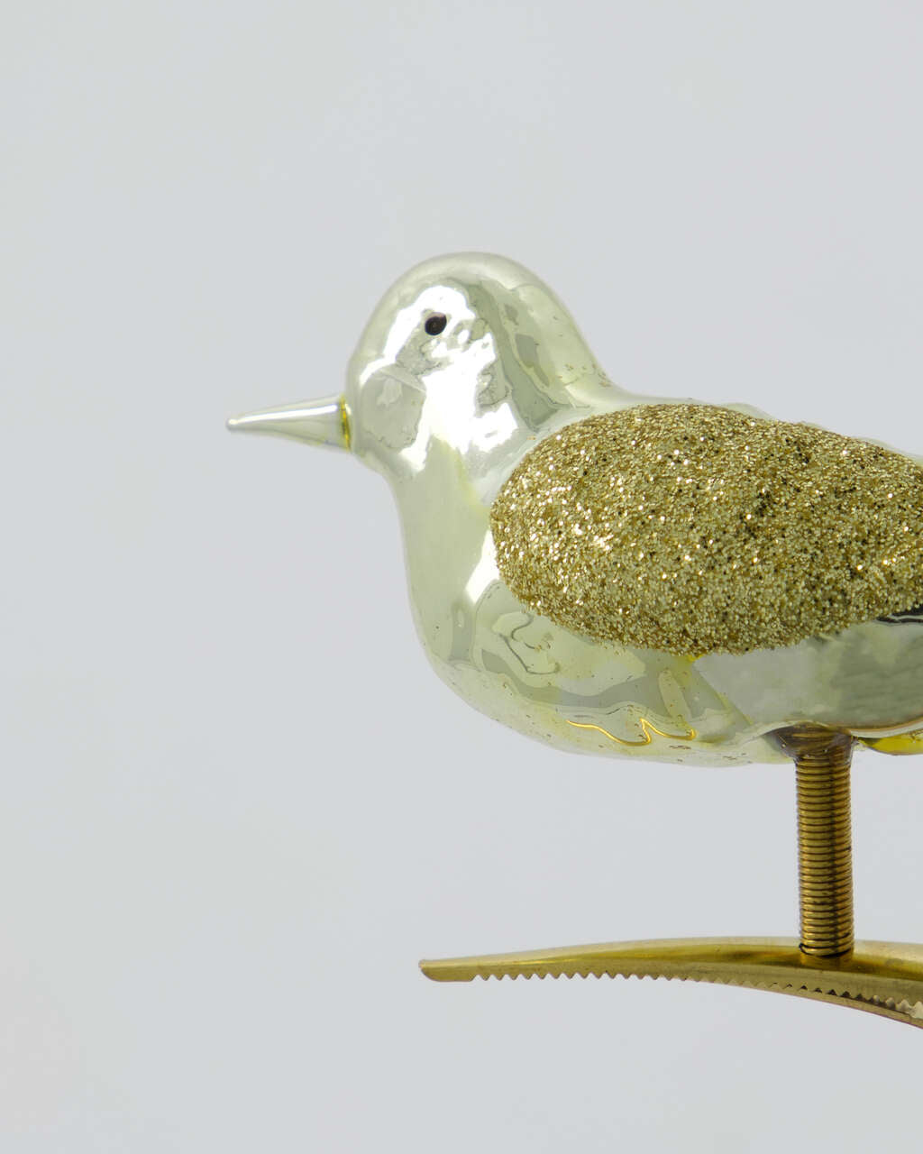 House Doctor Golden koristelintu nipistimellä