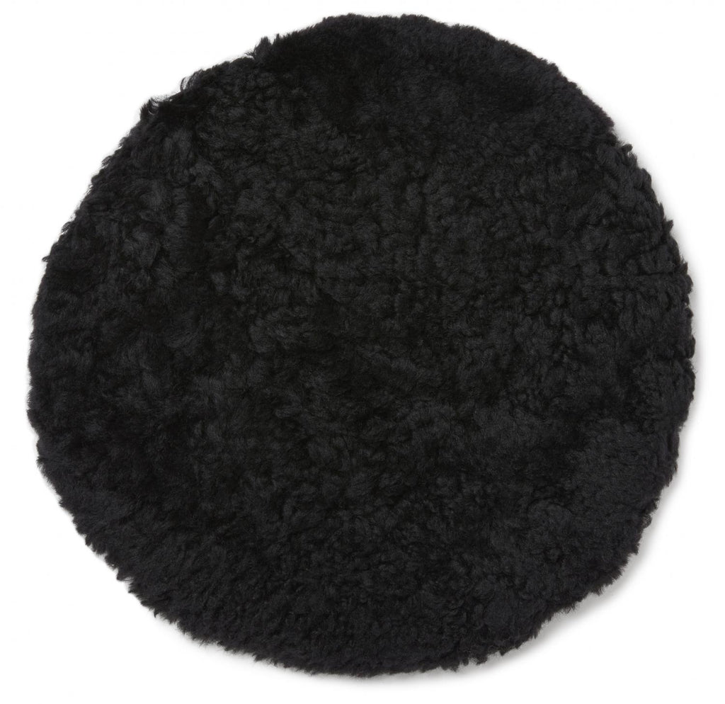 Skinnwille Curly istuintyyny musta 34 cm